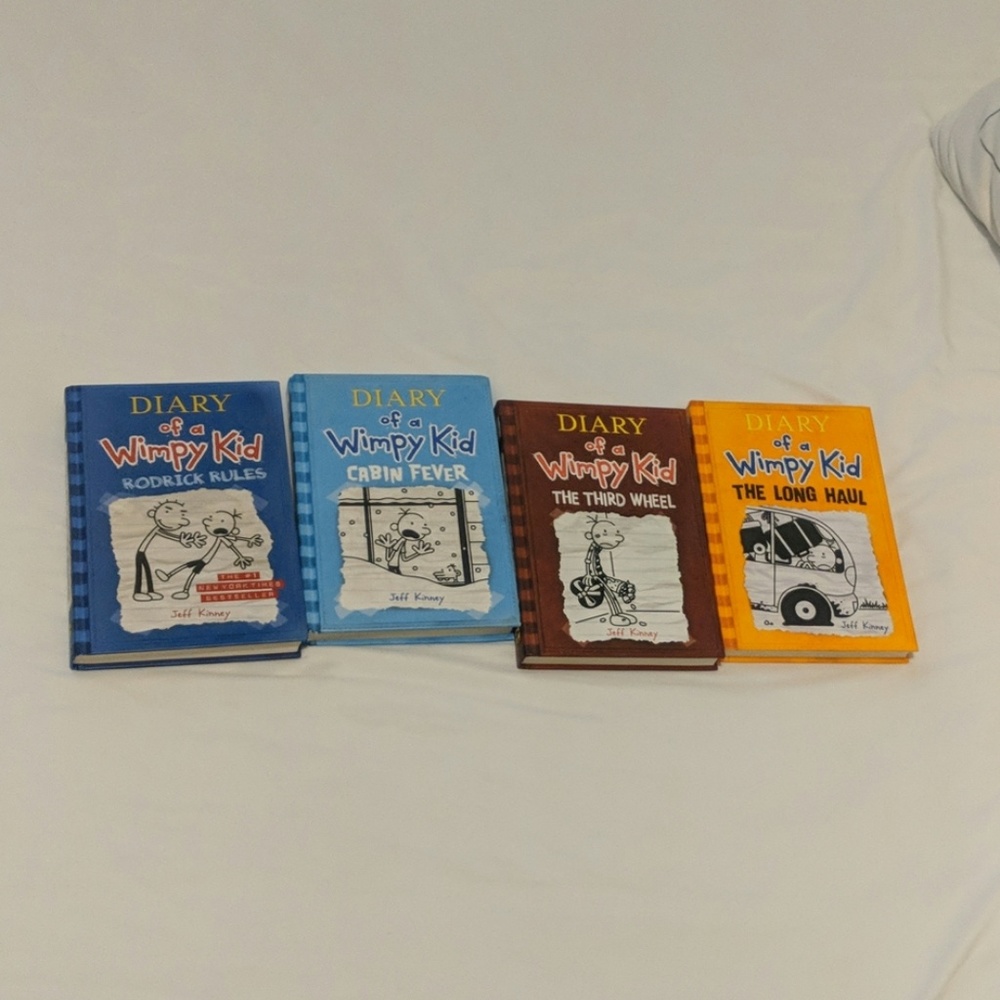4 perfect condition diary of a wimpy kid books.